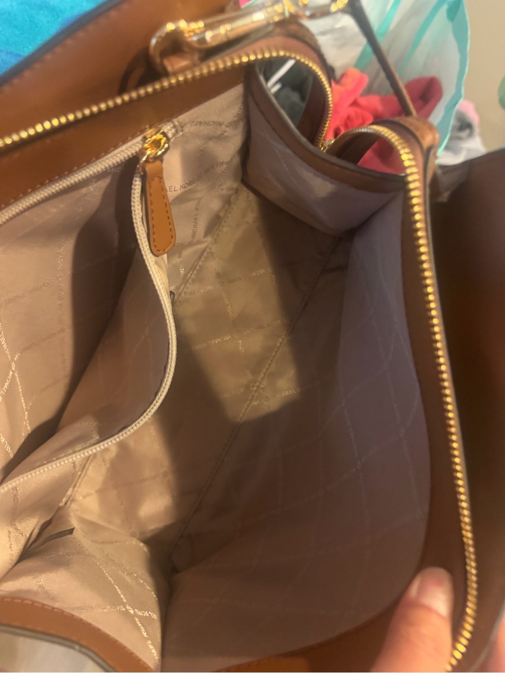 Michael Kors bag with matching wallet it’s brand new  only used a couple times .